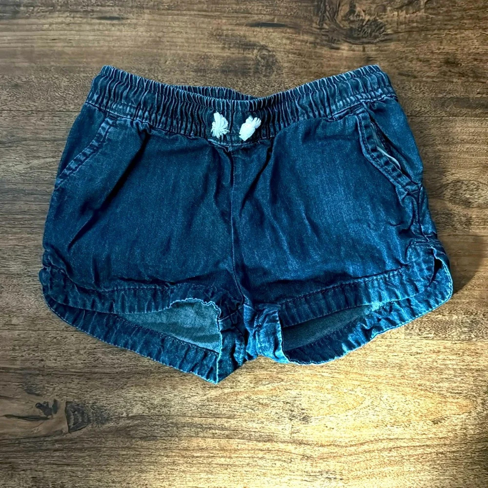 Girls pull on shorts